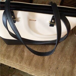 Large purse never carried.